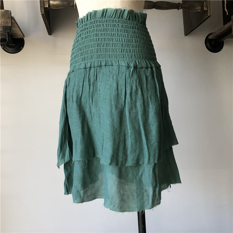 A Fringed Summer Cotton Beach Shorts by Beachy Cover Ups on a mannequin.