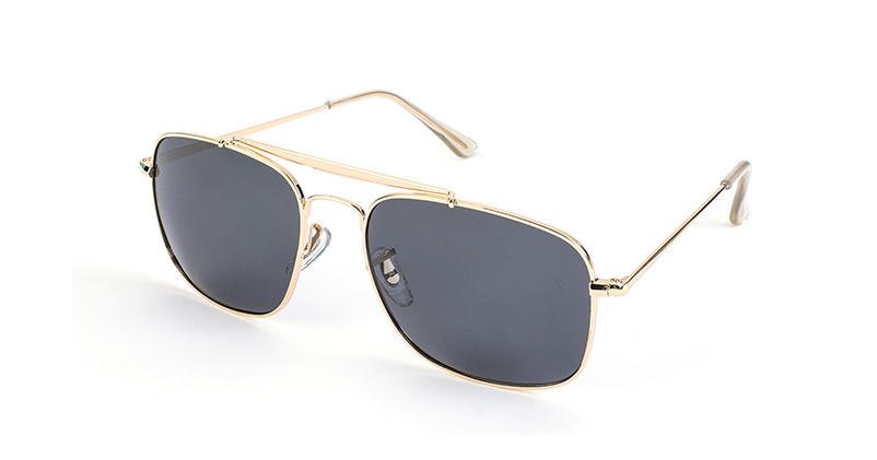 A pair of Metal Framed Polarized Sunglasses by Beachy Cover Ups, perfect for beachgoers.