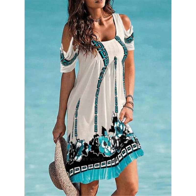 A woman wearing a Beachy Cover Ups Dress Printed Sexy Strap Dress on the beach.
