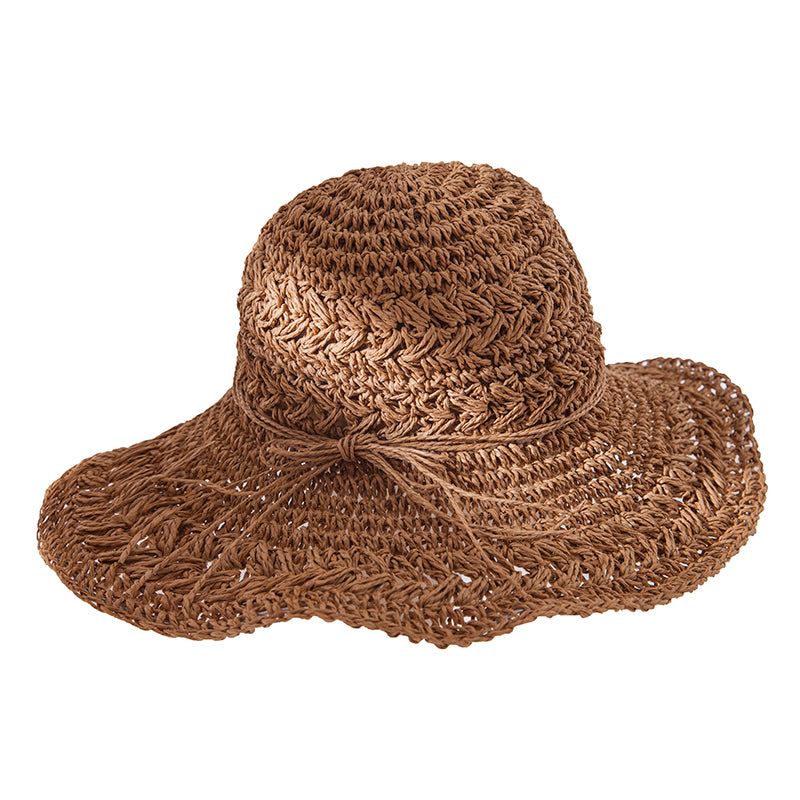 A Foldable Seaside Beach Hat by Beachy Cover Ups on a white background