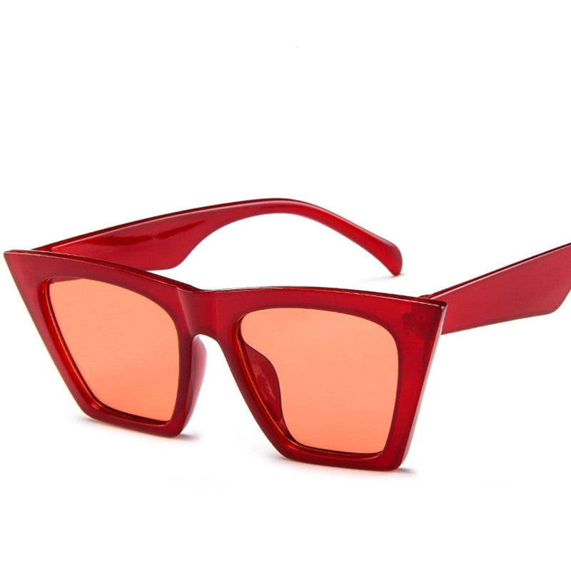 A pair of Beachy Cover Ups Trapezoid Retro Sunglasses with vintage aesthetics.