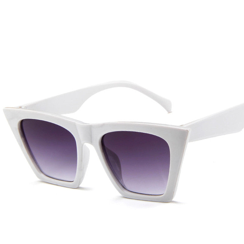 A pair of Trapezoid Retro Sunglasses from Beachy Cover Ups with purple lenses.