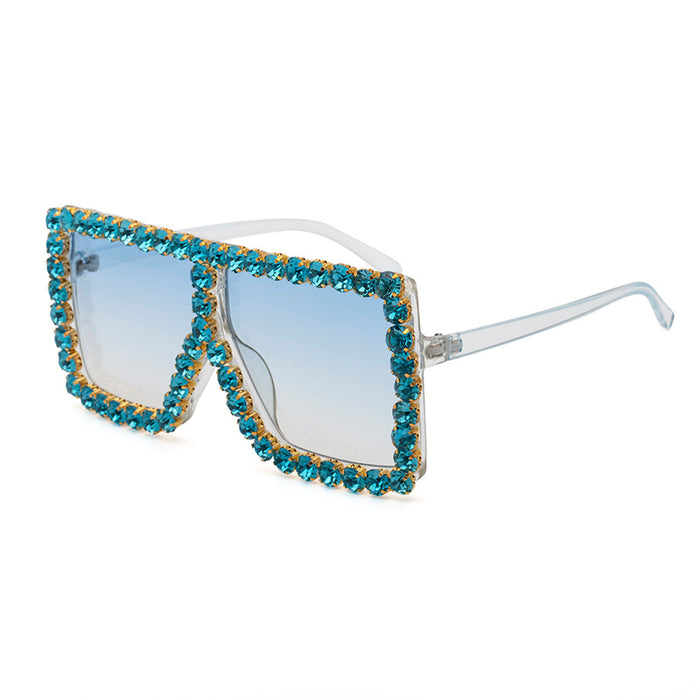 A pair of Diamond-studded Colored Square Sunglasses by Beachy Cover Ups with UV protection.