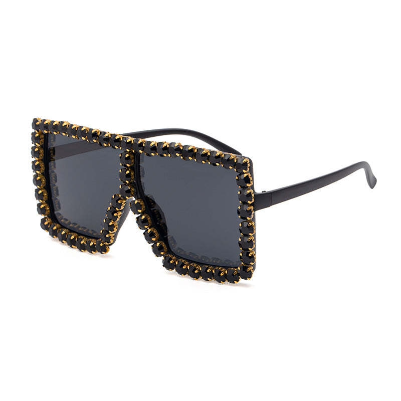 A Diamond-Studded pair of Sunglasses with UV protection would be replaced with: A Diamond-studded Colored Square Sunglasses from Beachy Cover Ups with UV protection.