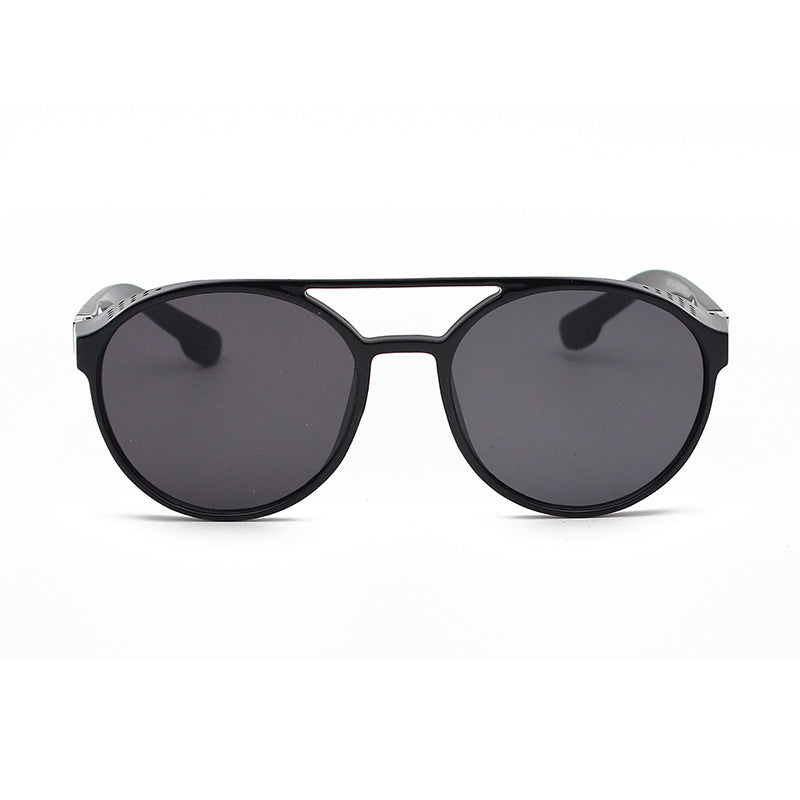 A pair of black Beachy Cover Ups beach steampunk sunglasses on a white background.