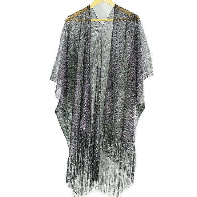 A grey fringed Gold Or Black Tassel Bikini Cover Up Beach Jacket perfect for a bikini cover up on the beach by Beachy Cover Ups.