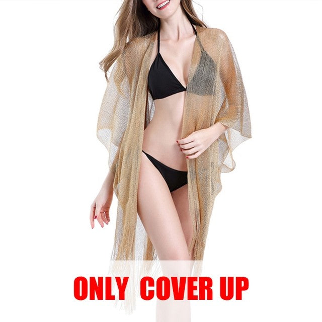A woman is posing in a Gold Or Black Tassel Bikini Cover Up Beach Jacket by Beachy Cover Ups.