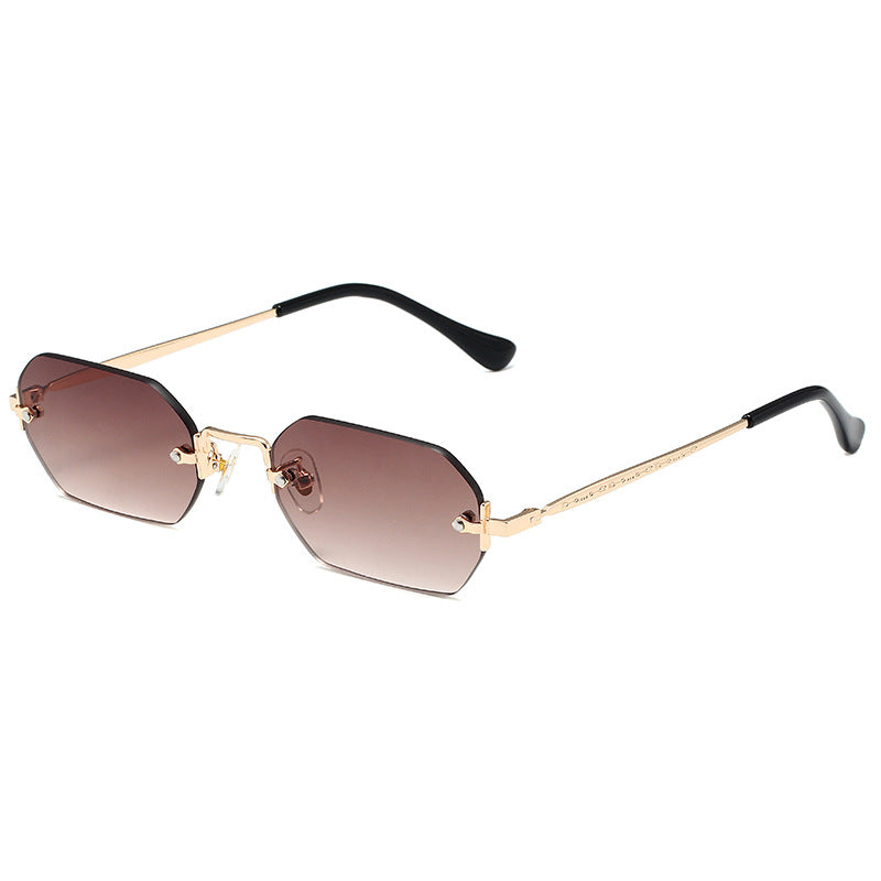 A pair of Beachy Cover Ups Polygon Square Sunglasses with UV protection and a gold frame.