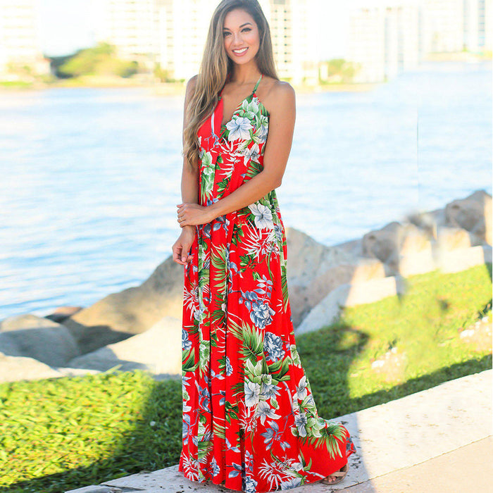 A woman in a Long Floral Resort Beach Dress by Beachy Cover Ups.