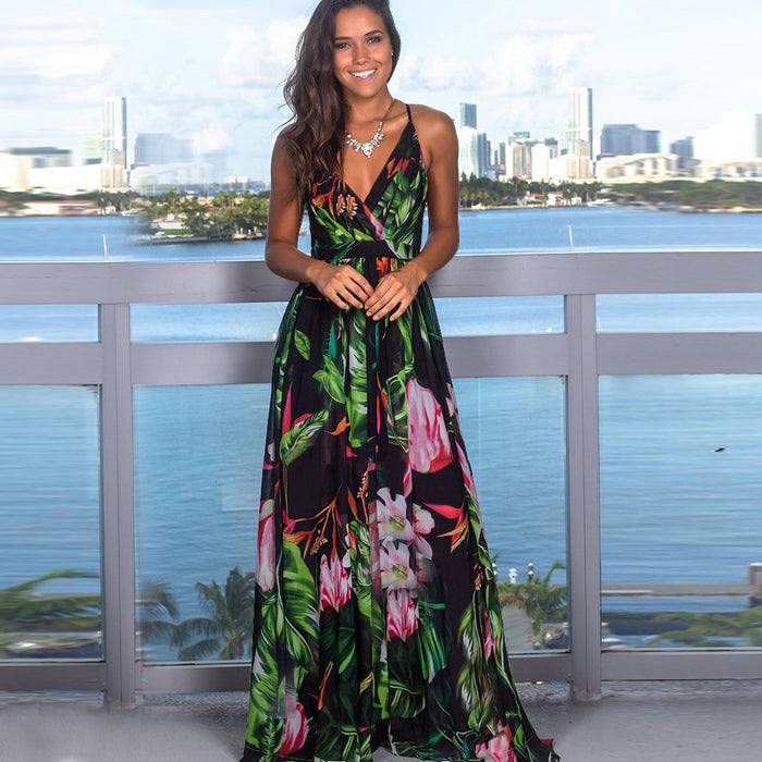 A woman in a Beachy Cover Ups Long Floral Resort Beach Dress standing on a balcony.