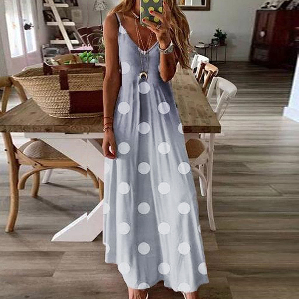 Beachy Cover Ups' Printed Polka Dot Beach Sling Long Skirt is a contemporary beach style with a sleeveless v-neck design.