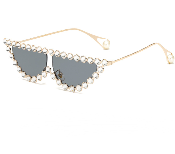 A pair of Beachy Cover Ups' Studded Cat's Eye Sunglasses with rhinestones and a gold frame.