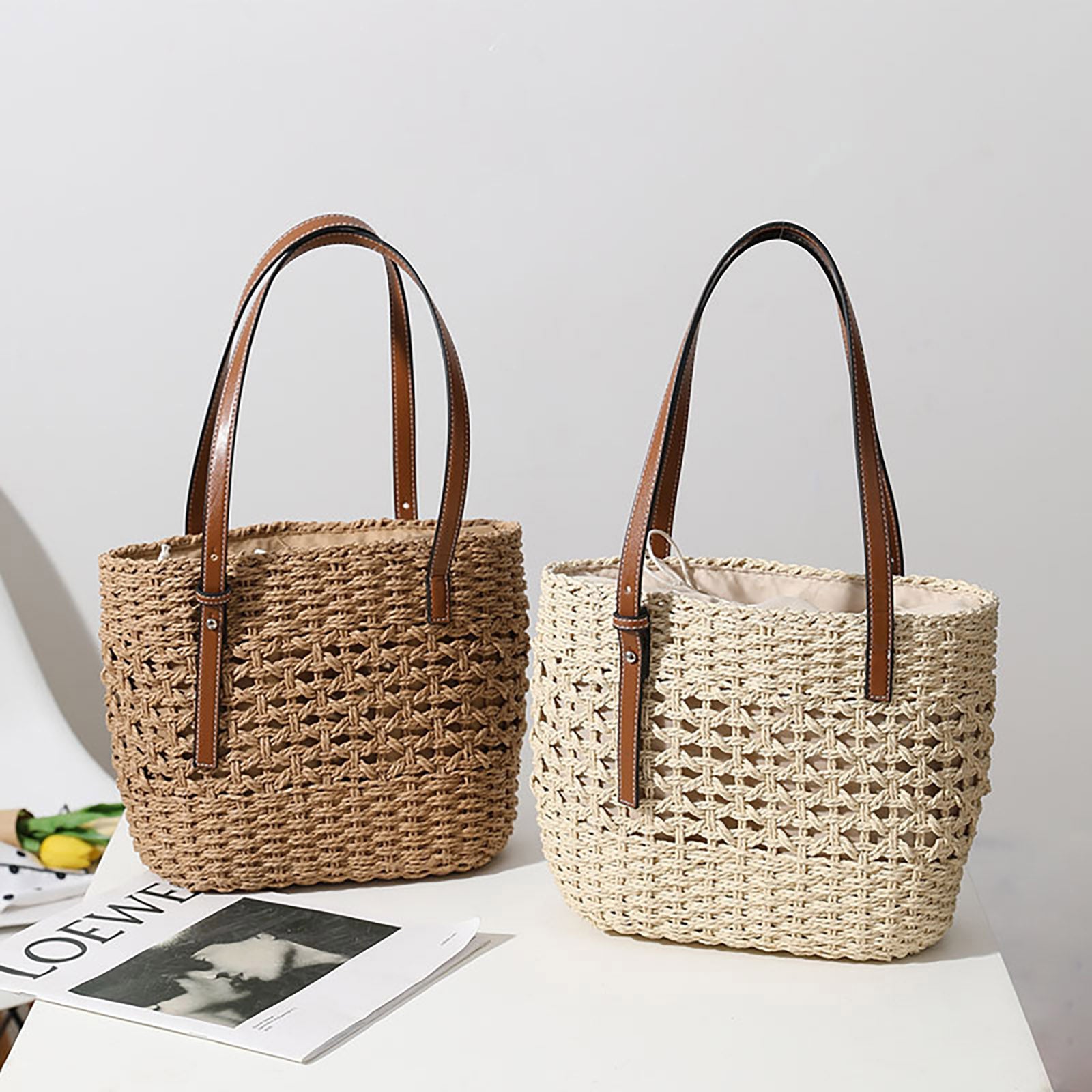 Two Beach Fashion Woven Shoulder Bags by Beachy Cover Ups on a table.