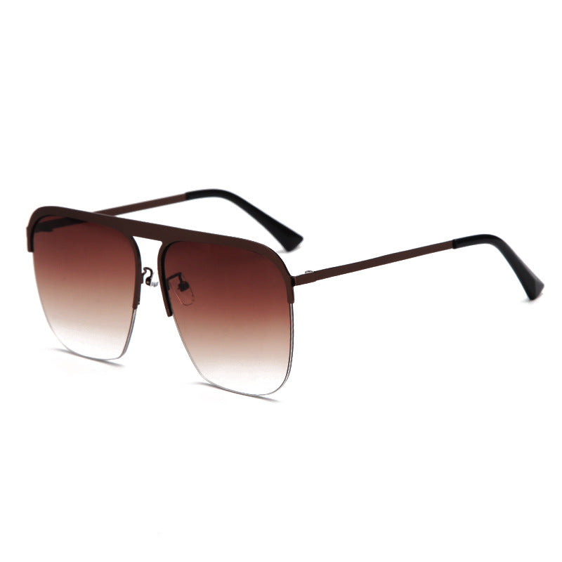 A stylish pair of Beachy Cover Ups Large Half Frame Sunglasses with brown lenses on a white background.