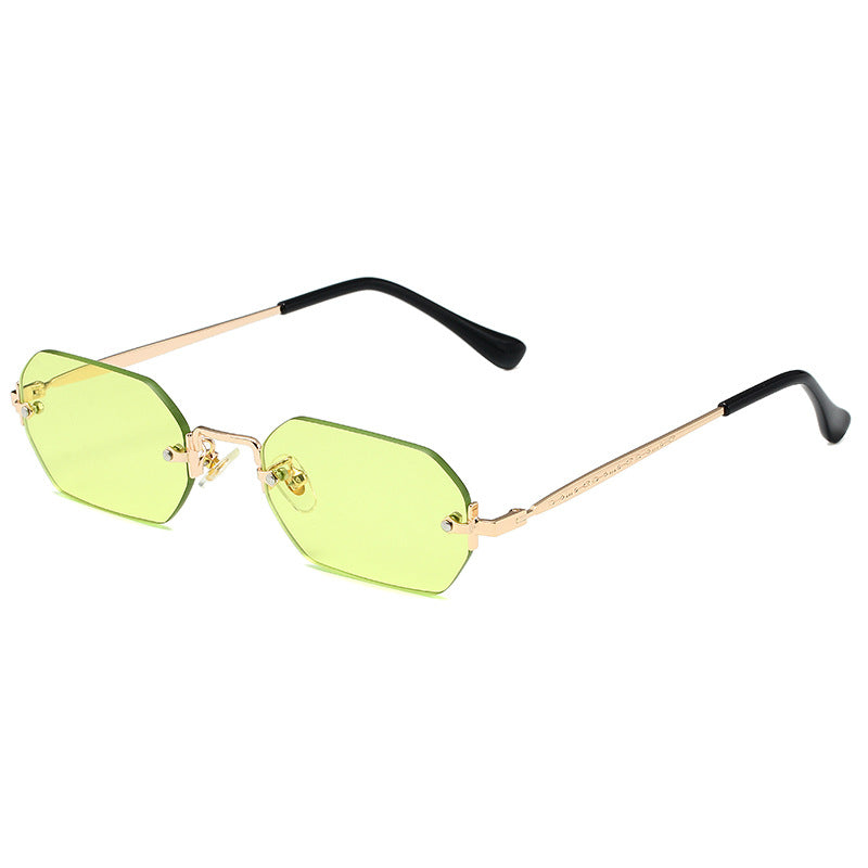 A pair of green Polygon Square Sunglasses by Beachy Cover Ups with gold rims.