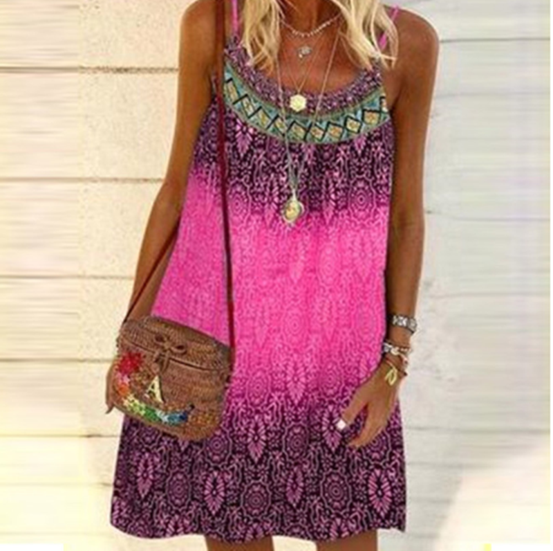 A woman embracing Beach Boho vibes in a pink sleeveless Beach Boho Camisole Loose Dress by Beachy Cover Ups.