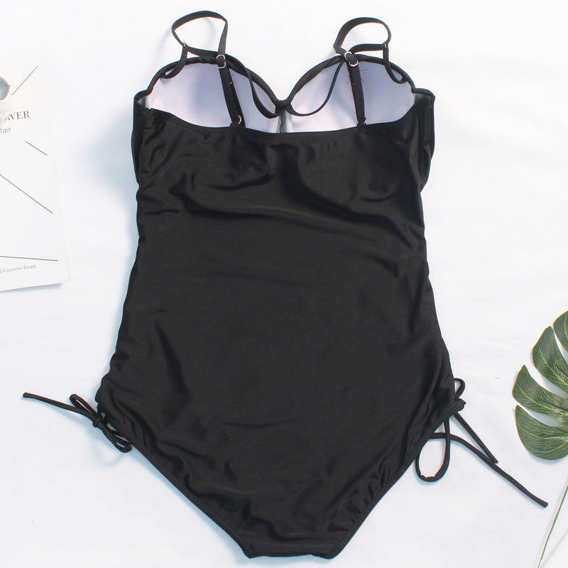 A comfortable Slimming Black Plus Size One-Piece Swimsuit Side Design swimsuit by My Store.