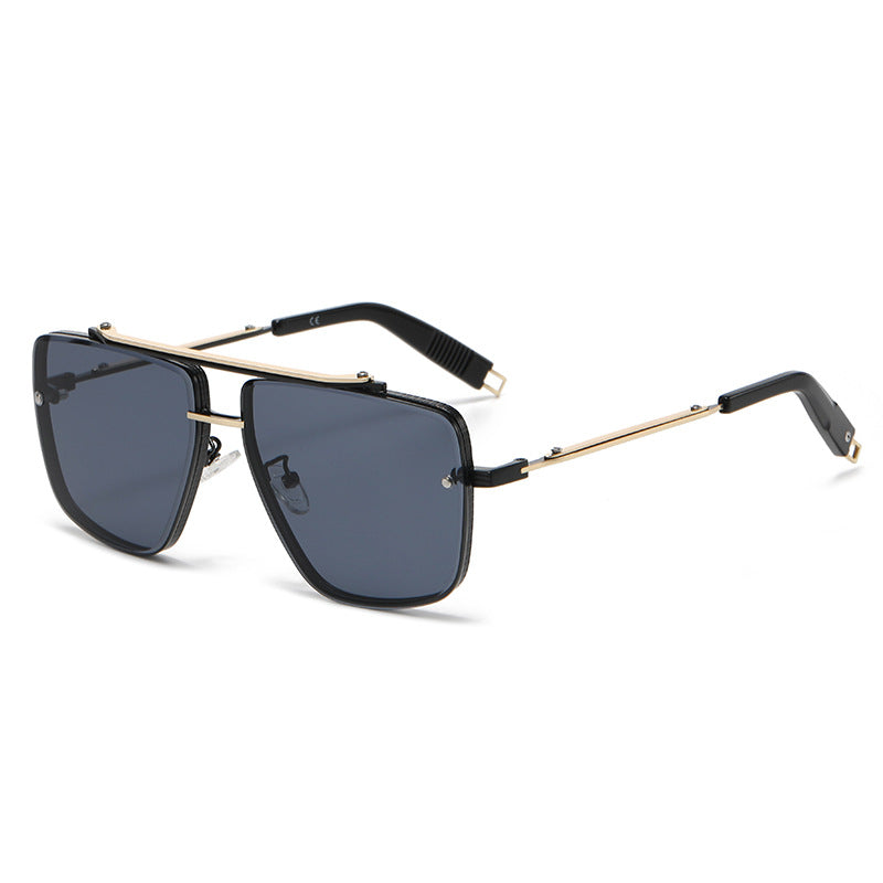 A fashionable pair of Twin-beam Metal Sunglasses with gold frames by Beachy Cover Ups.