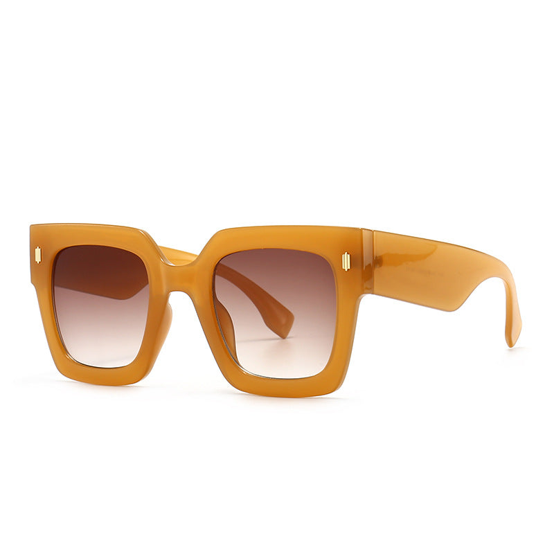 A Beachy Cover Ups pair of Trendy Large Frame Square Classy sunglasses with UV protection.