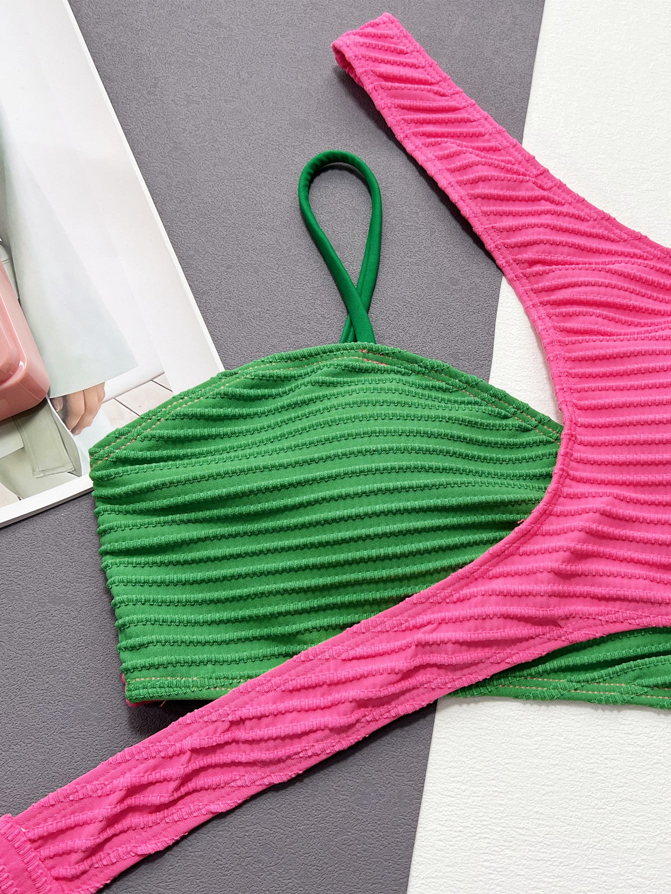 A Green Rose Red 2 Type Swimwear set by Beachy Cover Ups on a table.