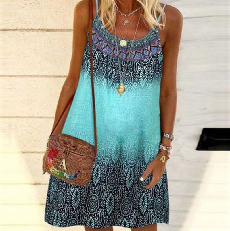 A bohemian woman wearing a Beach Boho Camisole Loose Dress from Beachy Cover Ups.