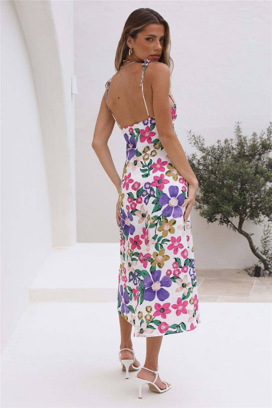 A Floral Summer Halter Slit Dress by Beachy Cover Ups.