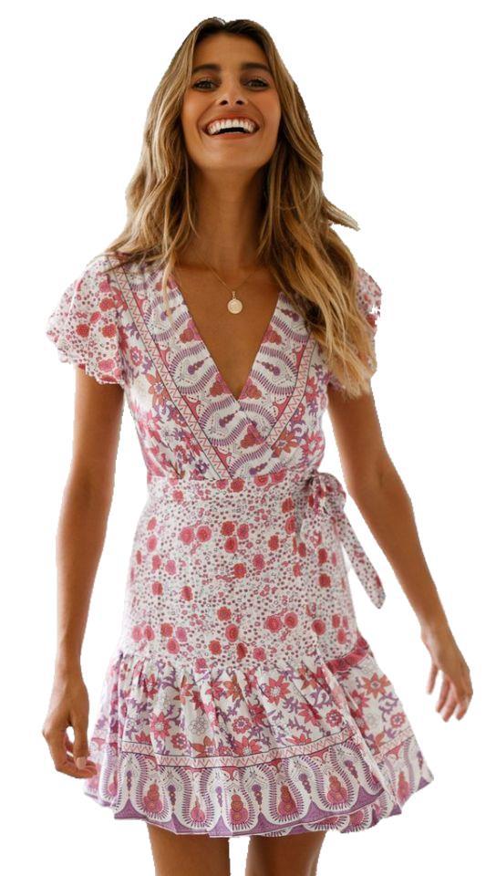 A versatile Beachy Side Wrap Summer Midi Dress by Beachy Cover Ups for beachside wear, featuring a pink and white floral print.