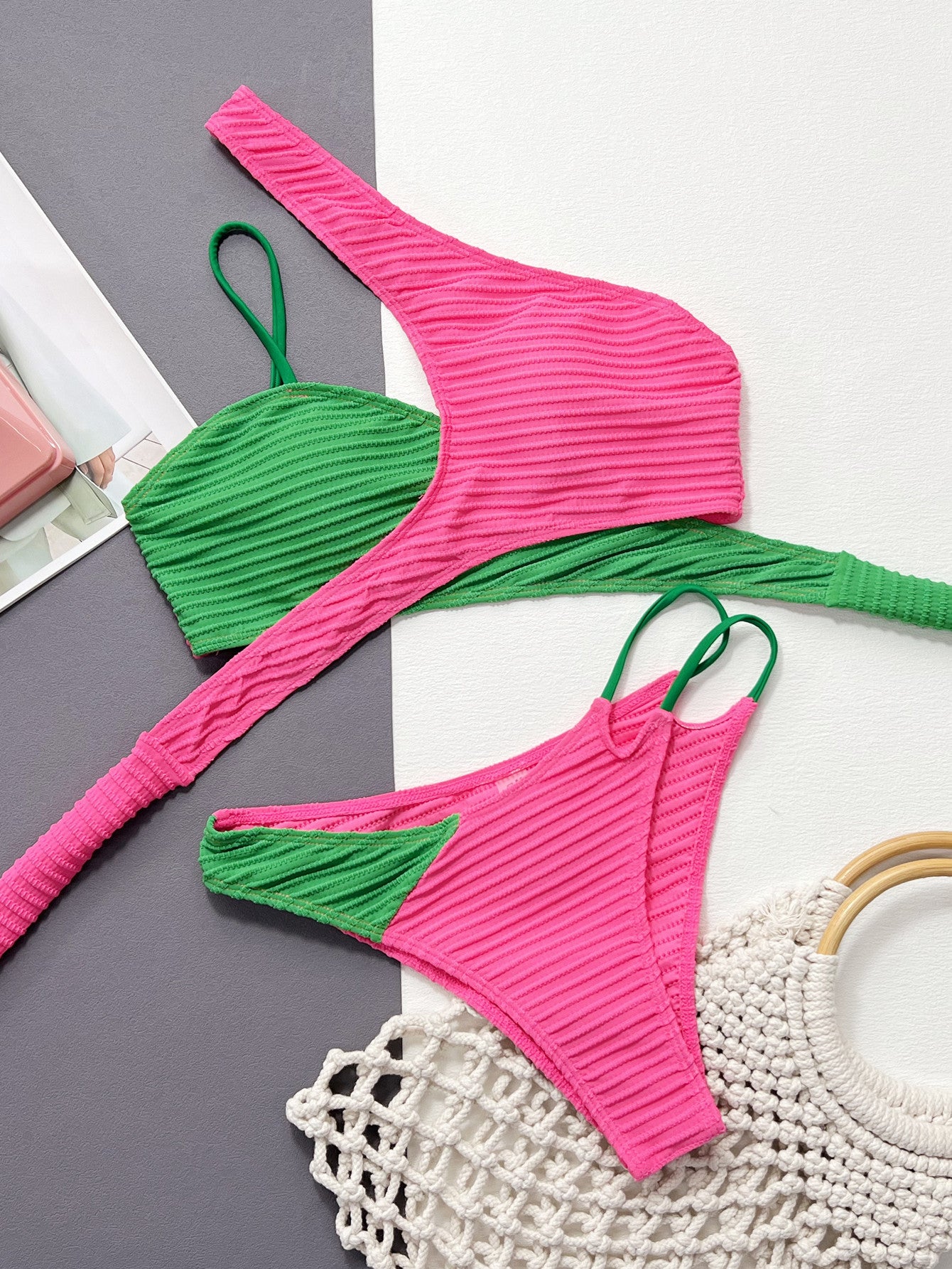 A Green Rose Red 2 Type Swimwear set inspired by art, featuring a pink and green color scheme accessorized with a matching bag, created by Beachy Cover Ups.