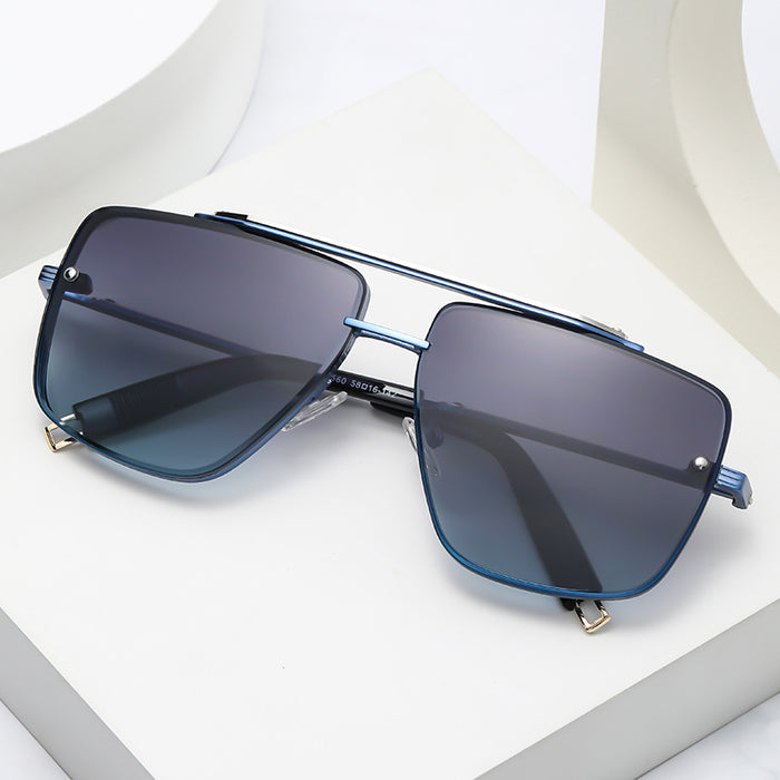 A fashionable pair of Twin-beam Metal Sunglasses by Beachy Cover Ups providing UV protection.