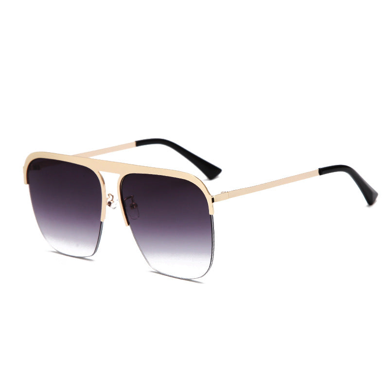 Stylish Large Half Frame Sunglasses with a gold half frame and black lenses from Beachy Cover Ups.