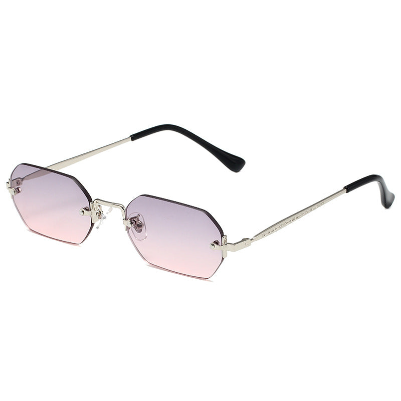 A pair of Beachy Cover Ups Polygon Square Sunglasses with UV protection.