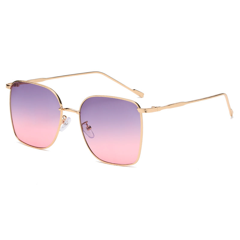 A pair of Square Sunglasses Cross-border Metal by Beachy Cover Ups with a gold metal frame and purple lenses.